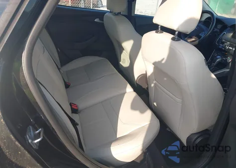 2015 Ford Focus Titanium from USA, damaged, VIN 1FADP3N24FL214270